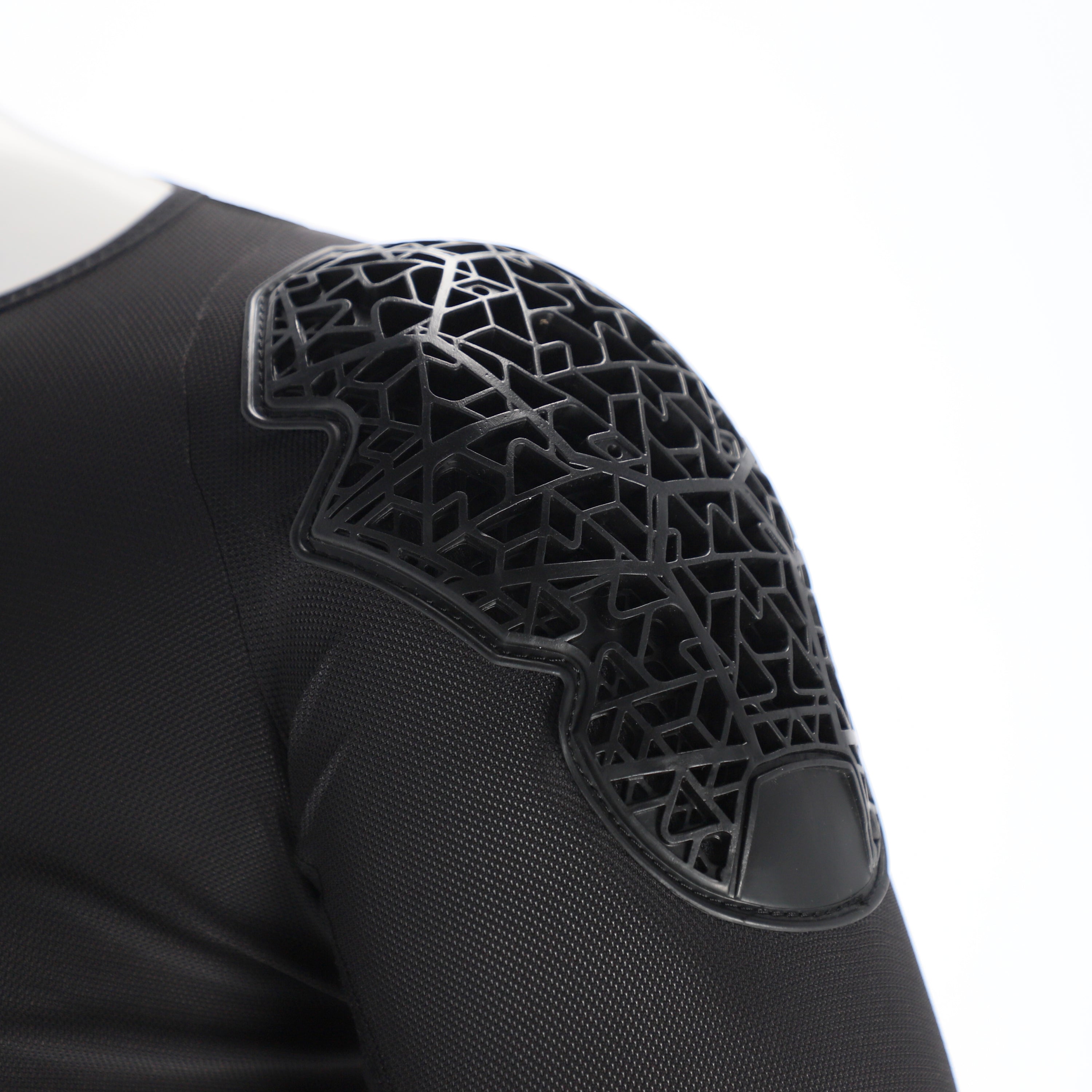 Black protective shoulder pad with geometric pattern on a white background