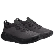 Black athletic shoes on a light gray background