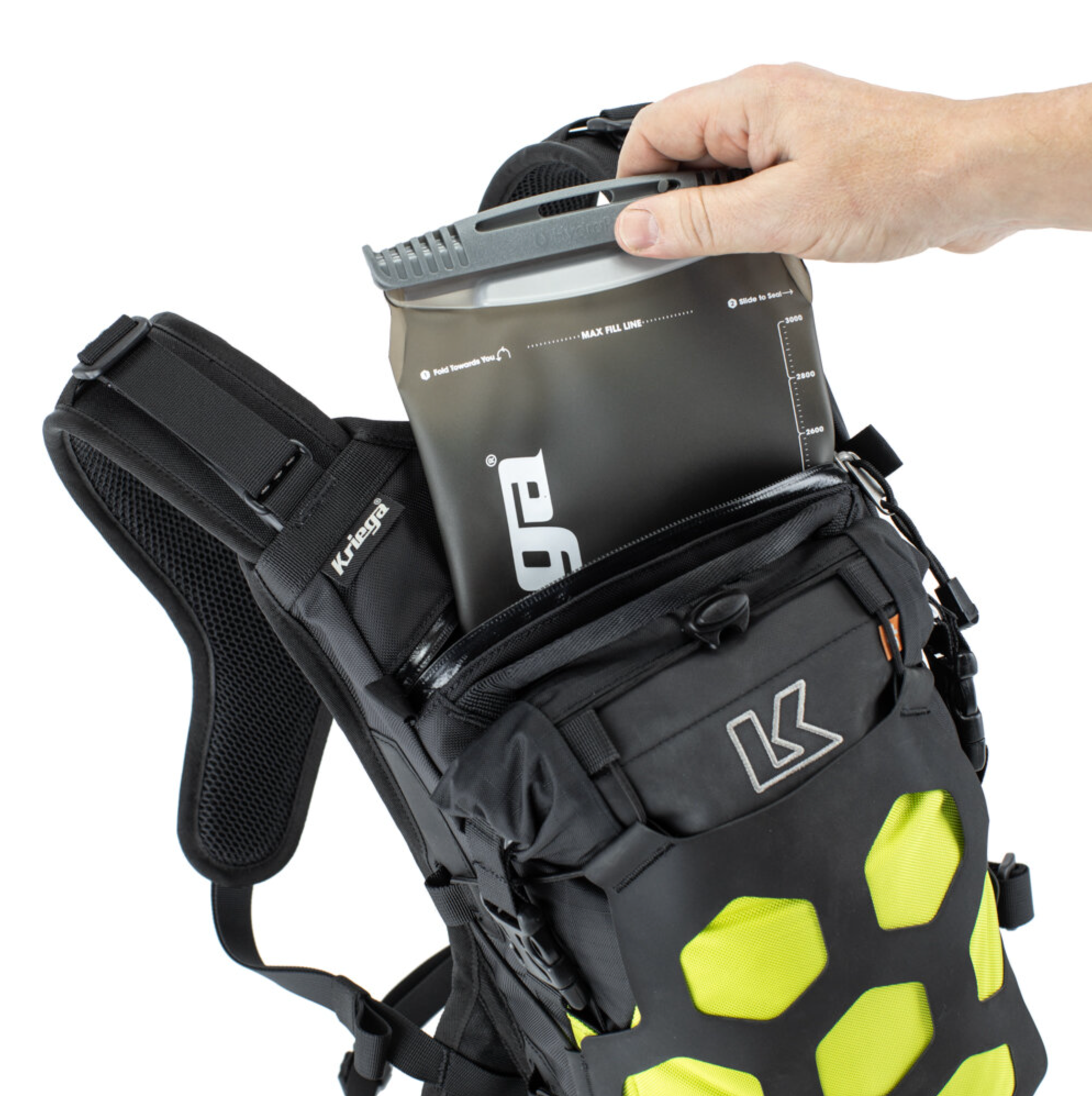 Black and green backpack with a Klymit insulated sleeping bag attached, on a white background.