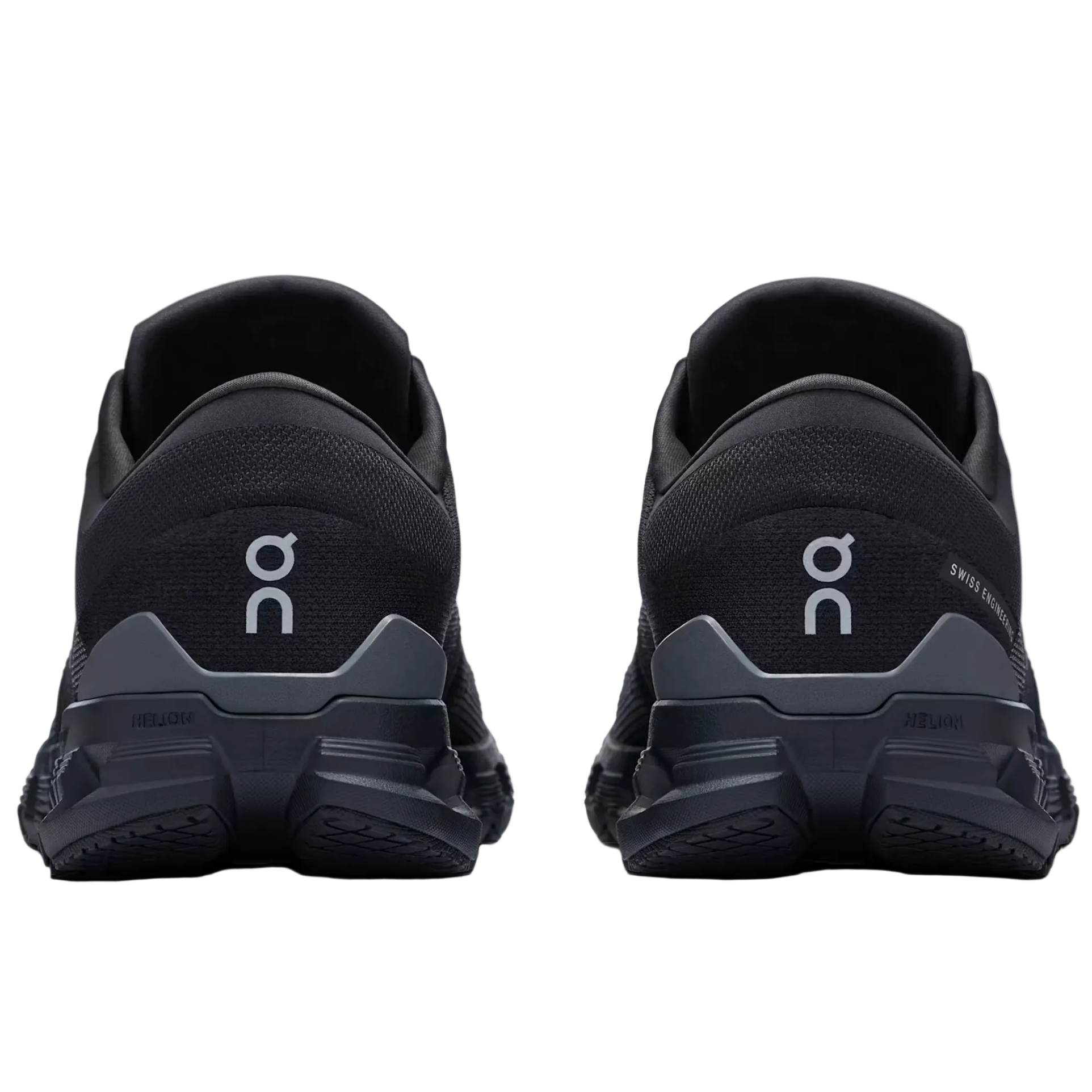 Black running shoes with 'on' logo on a light gray background