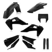 Set of black motorcycle plastic parts on a white background