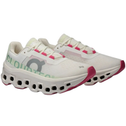 White running shoes with pink accents on a white background