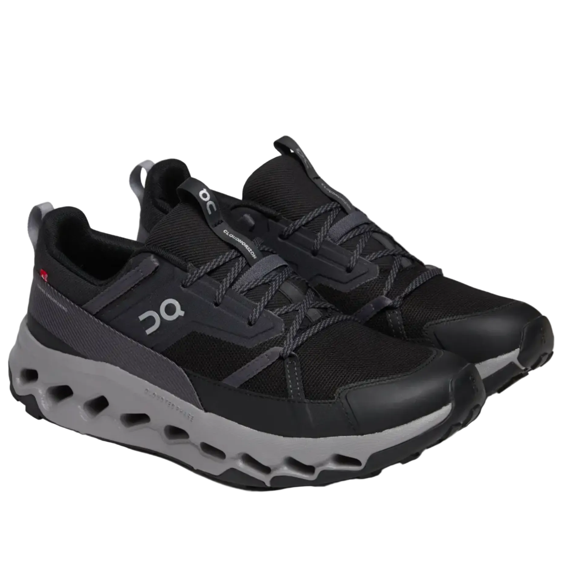 Black athletic shoes with gray sole on a white background