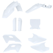 Set of white plastic motorcycle parts on a white background