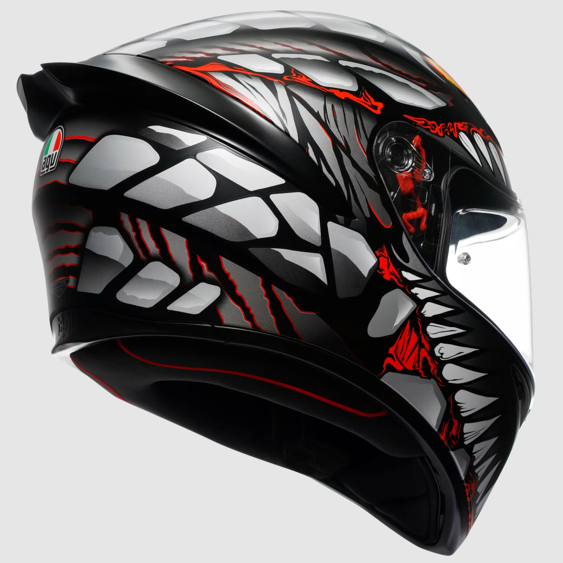 A full-face motorcycle helmet in black with a detailed graphic design featuring white cracked-glass patterns and red claw-like accents, shown from a side profile on a light gray background.