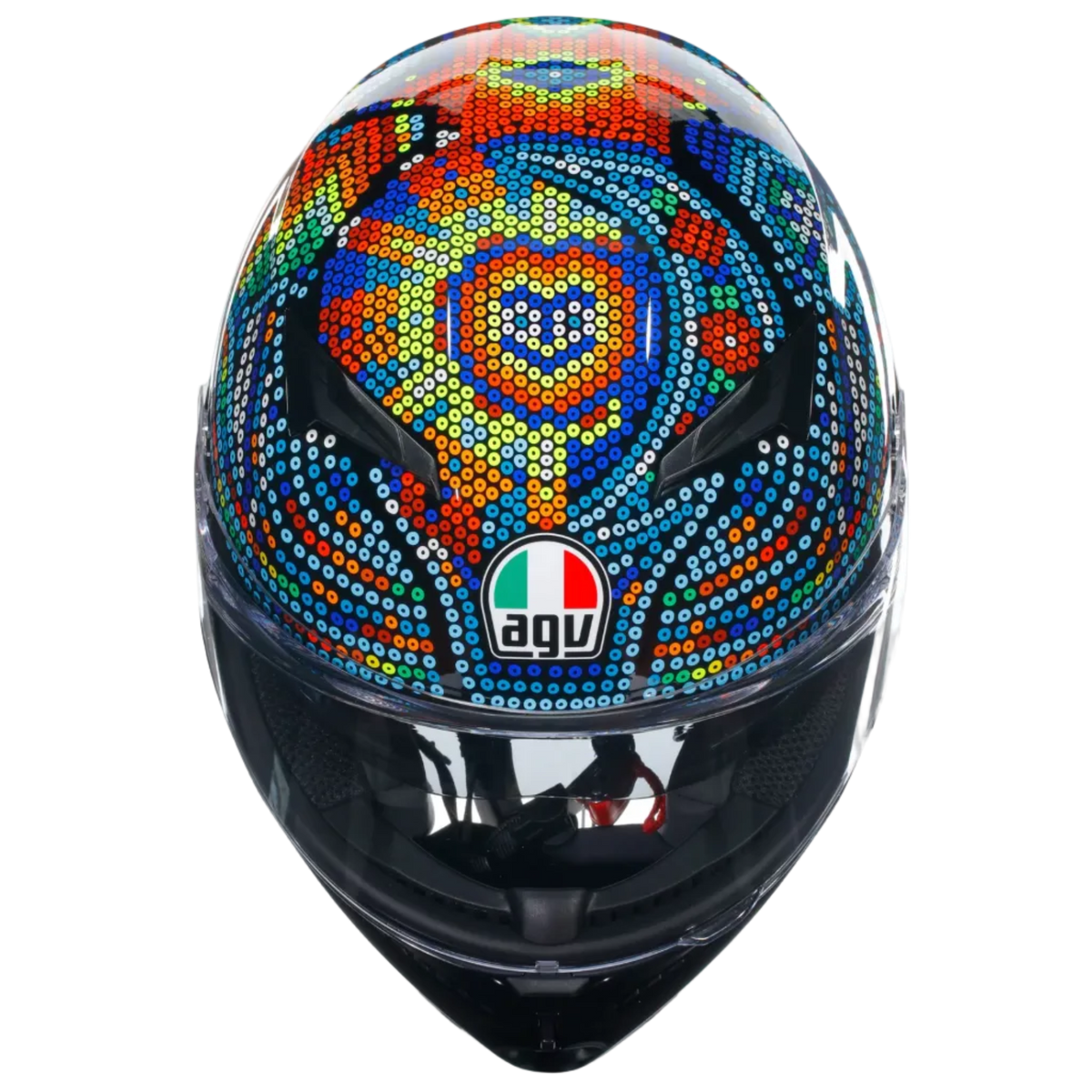 A full-face motorcycle helmet with a vibrant, multicolored mosaic dot pattern on the top and visor, featuring the AGV logo on the front.