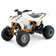 A white Honda TRX quad bike with gold and black graphics, featuring a visible orange-brown engine and suspension, photographed on a seamless white background.