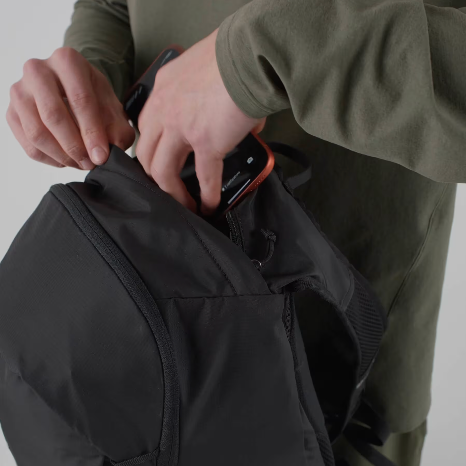 SALOMON ryggsäck Trailblazer 20 mustang/svart kaffe