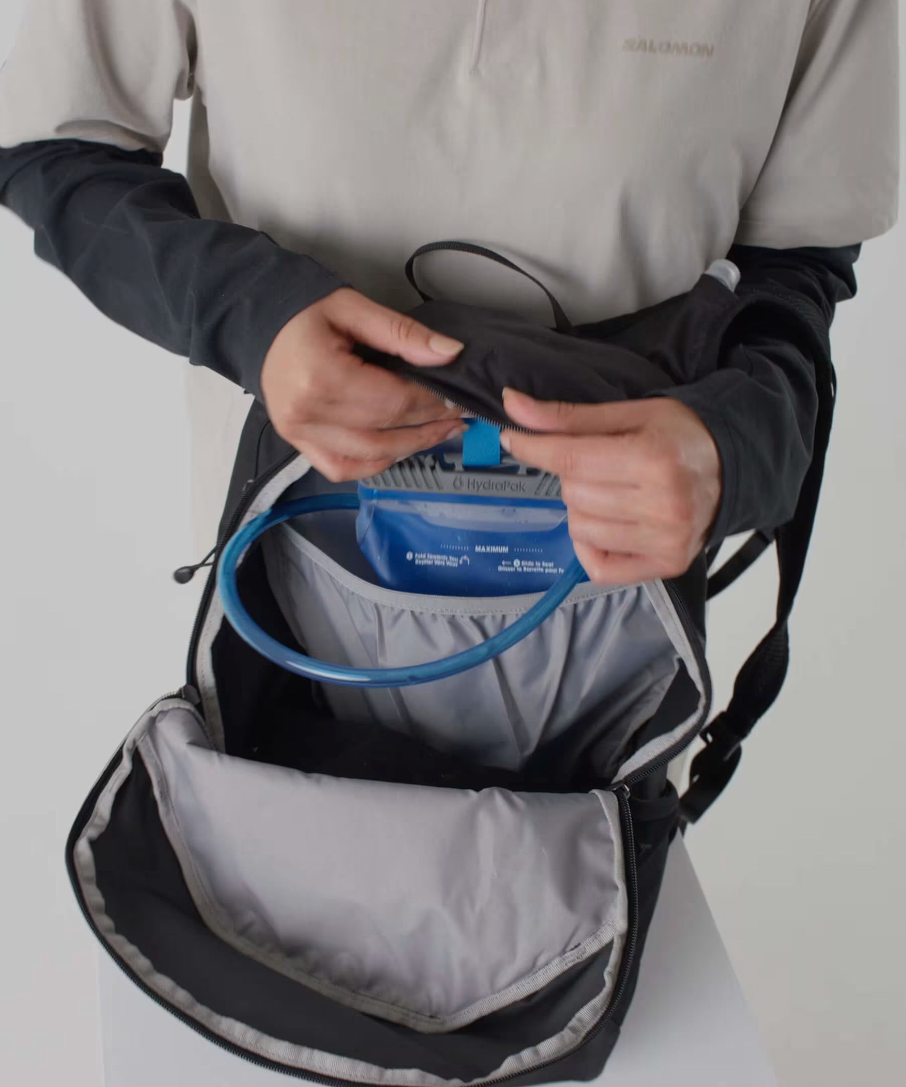 SALOMON ryggsäck Trailblazer 20 mustang/svart kaffe