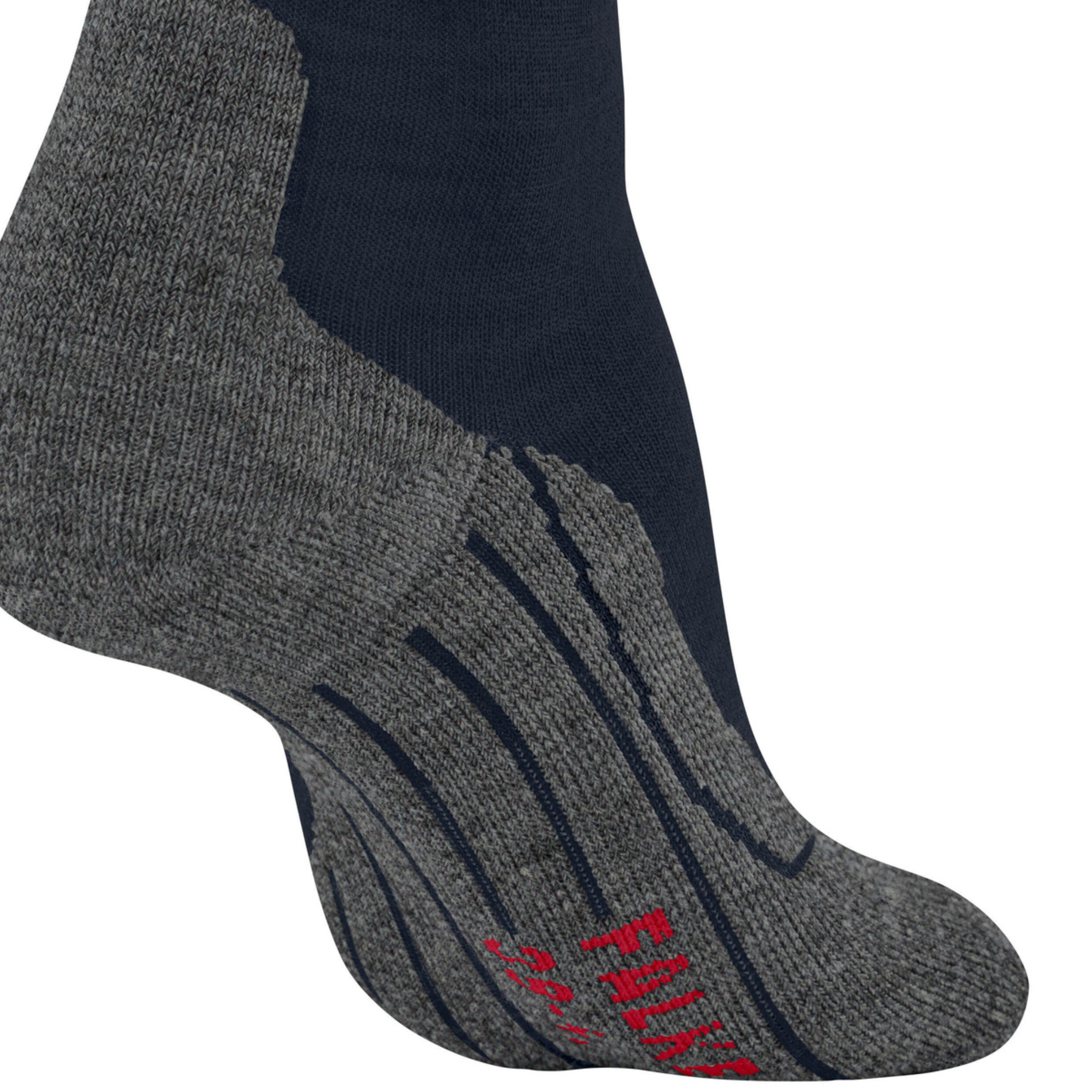 A close-up of a single sock on a white background, featuring a dark navy blue upper section, a textured heather gray foot and toe, and red striped compression-like detailing on the sole and heel.