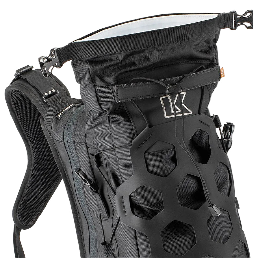 Black backpack with hexagonal pattern on a light gray background